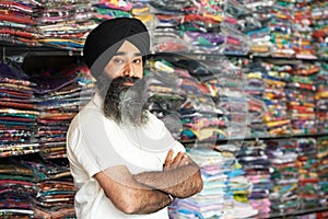 Young adult indian sikh seller man