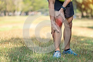 Young adult male with muscle pain during running. runner have knee ache due to Runners Knee or Patellofemoral Pain Syndrome,