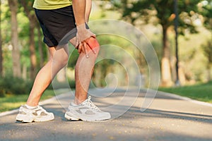 Young adult male with muscle pain during running. runner have knee ache due to Runners Knee or Patellofemoral Pain Syndrome,