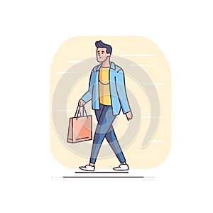 Young adult male walking casually holding shopping bag, dressed stylish casual wear. Man shopping photo