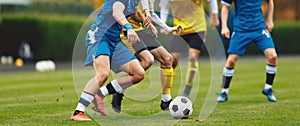 Young Adult Soccer Players Compete at the Pitch. Football League Game photo