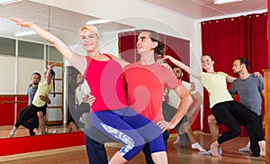 Young adults dancing in a studio