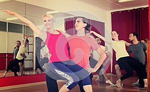 Young adults dancing in a studio