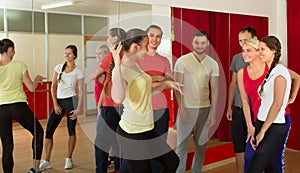 Young adults dancing in a studio