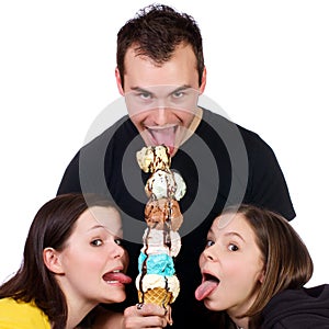 Young adults enjoying an ice cream tower photo