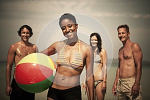 Young Adults enjoying themselves on a tropical beach