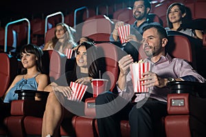 Young adults at the movie theater