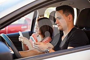 Young adults texting and driving
