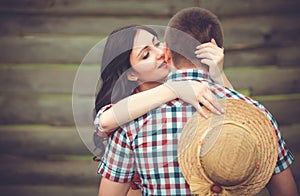 Young affectionate couple kissing tenderly