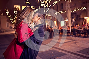 Young affectionate couple kissing tenderly