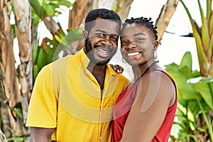 Young afircan american couple smiling happy and hugging at the city