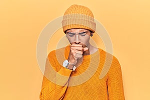 Young african amercian man wearing wool cap feeling unwell and coughing as symptom for cold or bronchitis