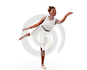 Young african-american ballet dancer in arabesque