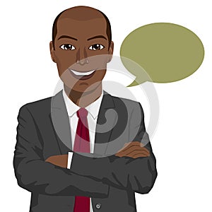 Young african american businessman with arms folded and speech bubble