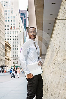 Young African American businessman with beard traveling, working in New York