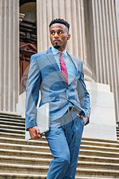 Young African American Businessman with beard working in New York