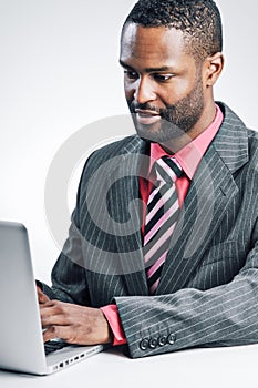 Young African American Businessman Being Sneaky On