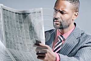 Young African American Businessman Being Sneaky On Laptop