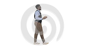 Young African american businessman gesturing and talking to came