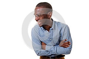 Young african american businessman with glasses laughing with arms crossed against isolated white background
