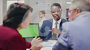 Young african-american businessman shaking hands