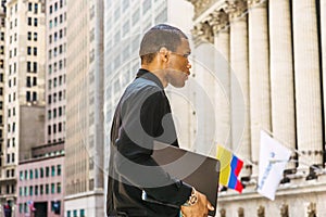 Young African American businessman travel in New York City