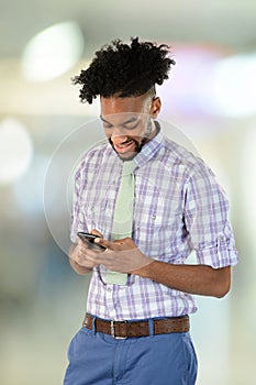 Young African American Businessman Using Cell Phone