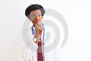 Young african american doctor man wearing sthetoscope over isolated white background with hand on chin thinking about question,