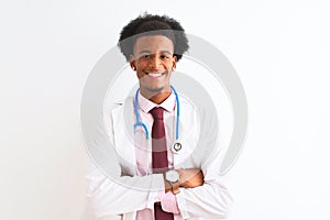 Young african american doctor man wearing sthetoscope over isolated white background happy face smiling with crossed arms looking