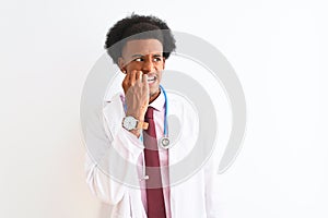 Young african american doctor man wearing sthetoscope over isolated white background looking stressed and nervous with hands on