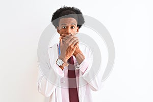 Young african american doctor man wearing sthetoscope over isolated white background shocked covering mouth with hands for mistake