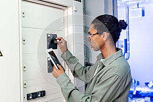 young african american engineer making diagnostics