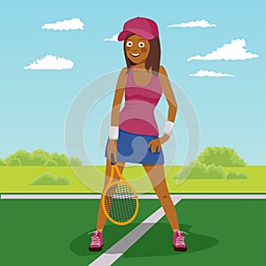 Young african american female tennis player posing on the tennis court
