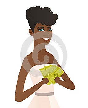 Young african-american fiancee holding money.