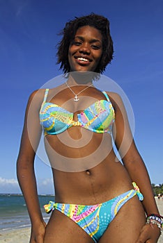 Young African American girl on Caribbean beach