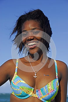 Young African American girl on Caribbean beach