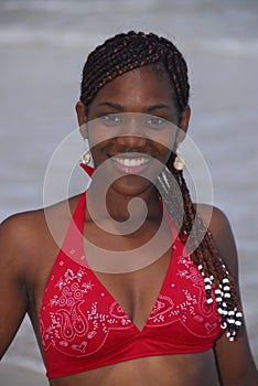 Young African American girl on Caribbean beach