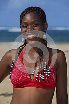 Young African American girl on Caribbean beach