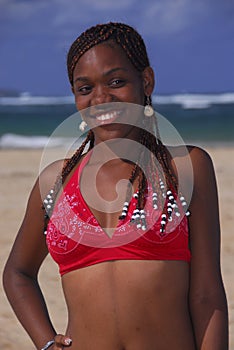 Young African American girl on Caribbean beach