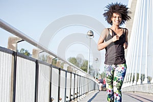 Young african american girl running.