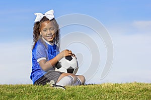Young african american girl soccer player