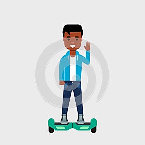 Young African American on hoverboard smiling and waving. Riding gyro scooter. Commuting concept.