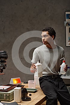young african american man carefully measuring