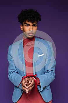 young african american man on purple