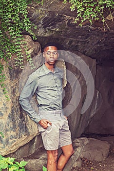 Young African American Man waiting for you at Central Park in New York