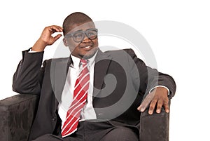 Young African American model in gray business suit red striped tie