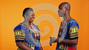 Young african american people greeting with fist bump