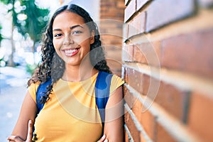 Young african american student girl smiling happy at university campus