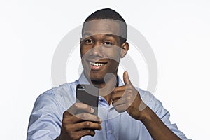 Young African American taking a picture with smartphone, horizontal