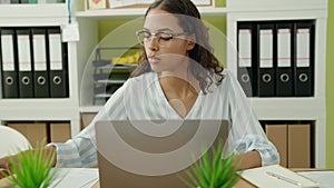 Young african american woman business worker working and speaking at office